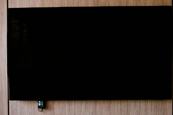 TV mounting in Beirut — flat-screen wall installation on concrete, brick and drywall with cable management